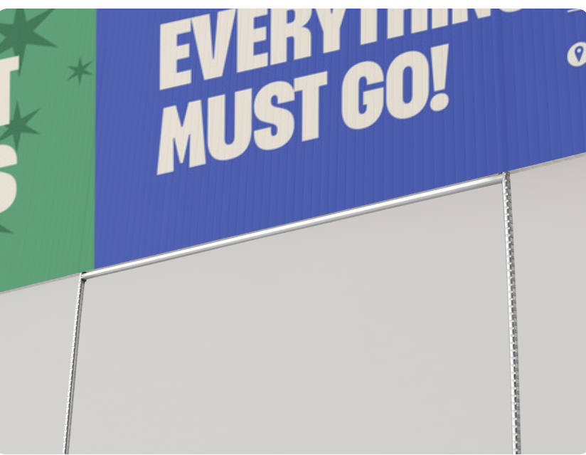 Close-up of full-color print detail on a yard sale sign